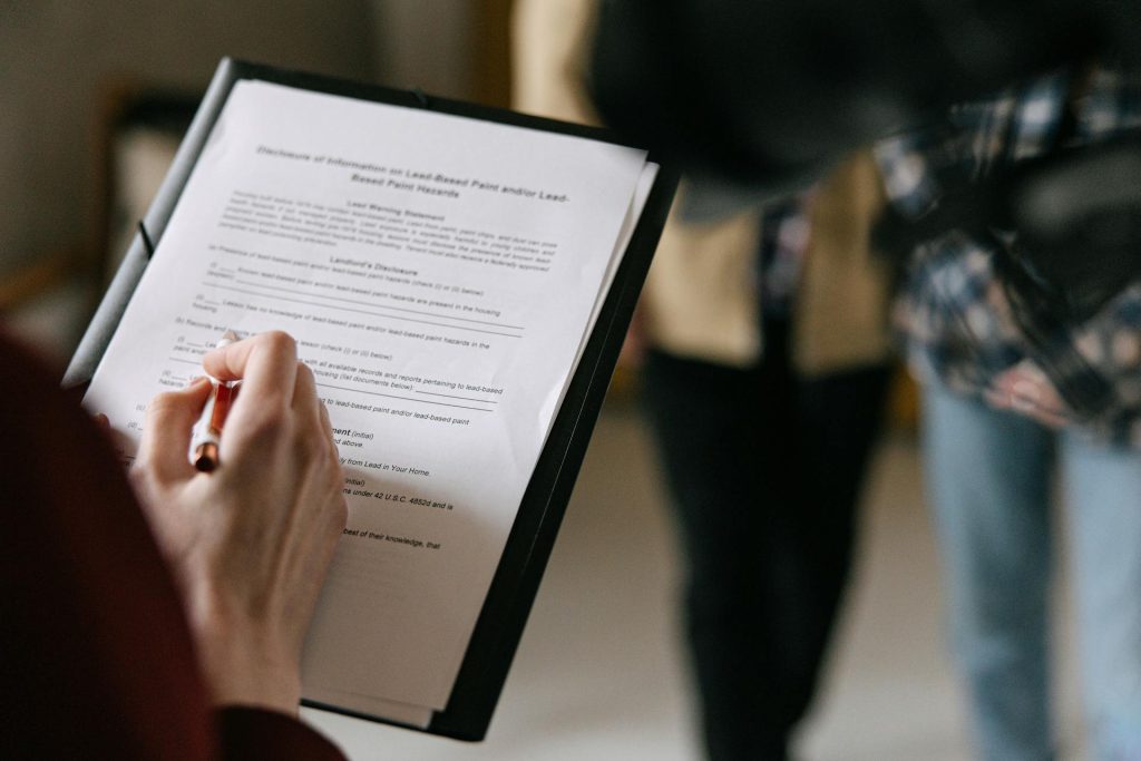 Professional holding documents during dispute mediation and communication support