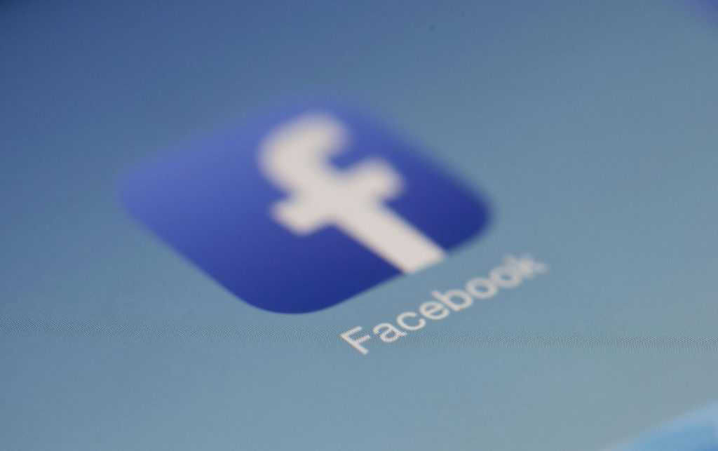 Close-up of Facebook logo on a mobile screen for social media marketing