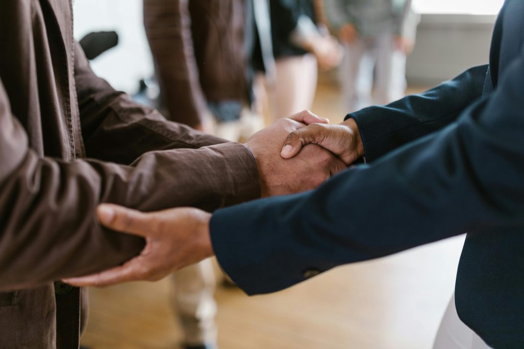 Business handshake symbolizing successful real estate partnership in Toronto