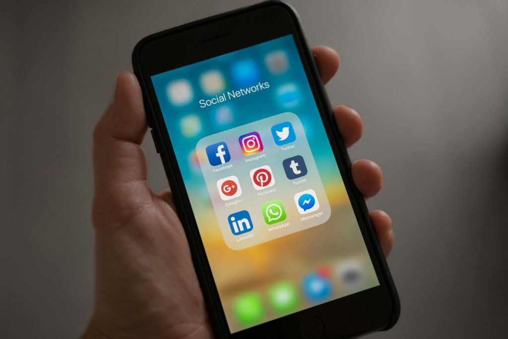Smartphone displaying social media apps